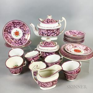 Thirty-two Pieces of Pink Lustre Ceramic Teaware. 