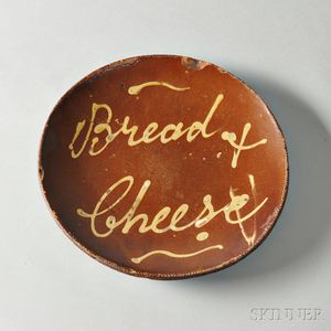 Redware Plate with Yellow Slip Inscription "Bread & Cheese,"