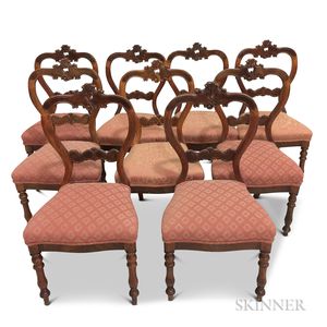 Set of Nine Rococo Revival Carved Fruitwood Chairs
