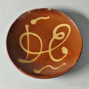 Redware Plate with Yellow Slip Inscription "DE,"