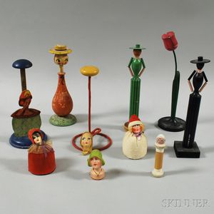 Ten Paint-decorated Papier-mache and Carved Wooden Hat Stands and Accessories