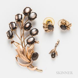 18kt Gold and Black Star Sapphire Brooch and Matching 14kt Gold and Black Star Sapphire Earrings and Pendant