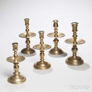Five Continental Brass Candlesticks