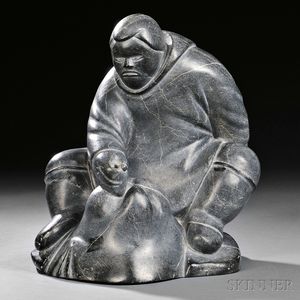 Inuit Sculpture of a Man and a Stylized Walrus