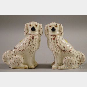 Pair of English Pink Lustre Staffordshire Seated Spaniels