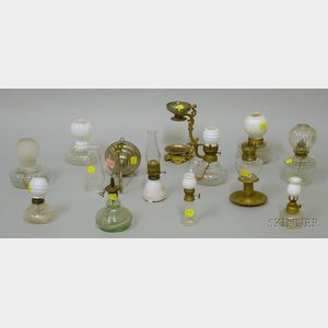 Twelve Assorted Small Glass and Metal Lamps