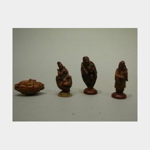 Four Chinese Carved Peach Pit Figures.