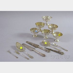 Weighted Silver Sherbet Cups and Eight Pieces of Sterling Flatware