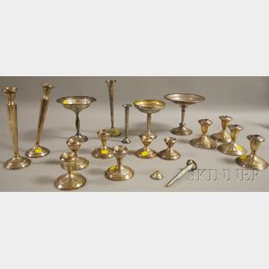 Eighteen Weighted Sterling Silver Candlesticks, Vases, and Compotes