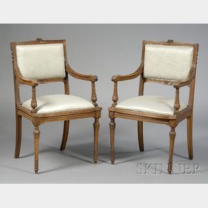 Pair of Louis XVI Style Carved Walnut Open Armchairs