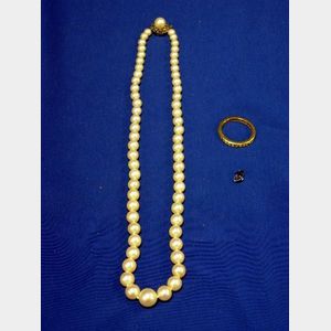Two Gem-set Jewelry Items and an Unmounted Sapphire