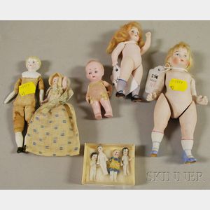 Nine Small Bisque and China Dolls