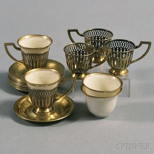 Five Matthews Co. Gilded Sterling Silver Demitasse Cup Frames and Eleven Saucers