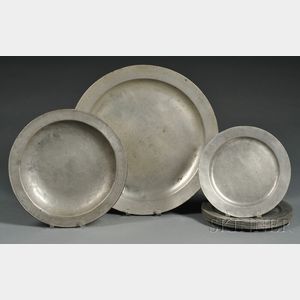 Eight Pewter Plates and Two Chargers