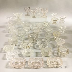 Thirty-five Colorless Pressed Glass Salts. 