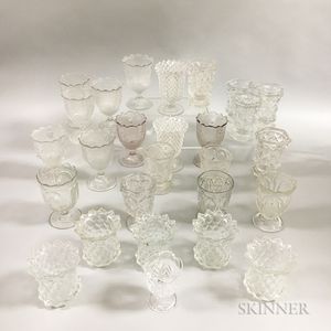 Twenty-seven Colorless Pressed Glass Spoon and Spill Holders. 