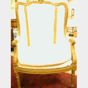 Louis XVI Style Upholstered Gilt Carved Wood Bergere.