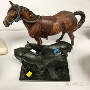 Polychrome Cast Iron Horse Doorstop, a Cast Iron Ship Doorstop, and a German White Metal Sculpture Depicting Two Horses