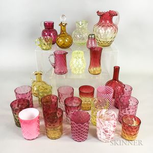 Twenty-seven Pieces of Mostly Cranberry and Amberina Glass Tableware. 