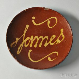 Redware Plate with Yellow Slip Inscription "James,"