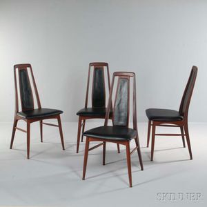 Four Eva Stuhl Dining Chairs