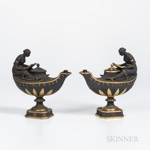 Two Wedgwood Gilded and Bronzed Black Basalt Oil Lamps and Covers