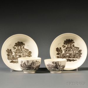 Two Staffordshire Cream-colored Earthenware Tea Bowls and Saucers
