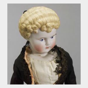Blonde Molded Hair Bisque Doll with Turned and Tilted Head