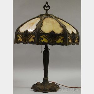 Octagonal Carmel Slag Glass Bent Panel and Metal Overlay Table Lamp with Cast Metal Base
