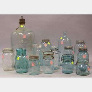 Twelve Assorted Aqua Glass Canning Jars, an Iron Mounted Aqua Glass "The Silent Glow Oil Burner" Bottle, and an Aqua Glass Bottle