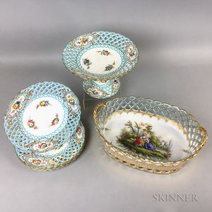Set of Four Minton Reticulated Ceramic Plates, a Compote, and a Center Bowl. 