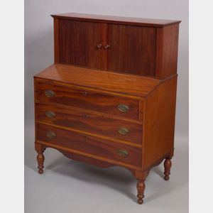 Federal Mahogany Tambour Desk, New England, c. 1820, the top section with flat-molded cornice and two sliding tambour doors revealing a