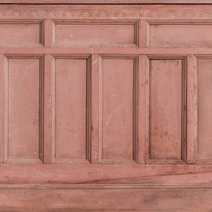 Four Carved and Salmon Red-painted Architectural Wainscot Panel Sections