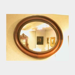 Victorian Walnut Oval Mirror.