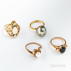 Four Gold and Gem-set Rings