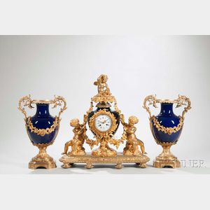 Three-piece Gilt-bronze-mounted Cobalt-ground Porcelain Clock Garniture
