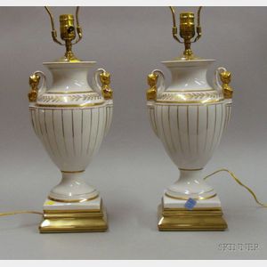 Pair of White Porcelain Urn-shaped Lamps with Gilt Accents.