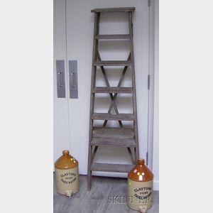 Two Claytons Pure Table Water Glazed Stoneware Jugs and a Gray-painted Wooden Step Ladder.