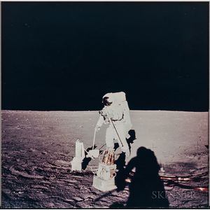 Apollo 12, Astronaut Alan L. Bean Deploys Components of the Apollo Lunar Surface Experiments Package (NASA AS12-47-6919),Novembe...