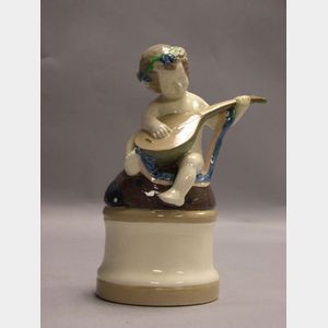 European Ceramic Child on Beetle Figural.