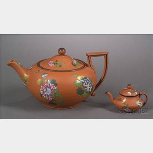 Two Wedgwood Rosso Antico Teapots and Covers