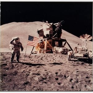 Apollo 15, Astronaut James B. Irwin Gives a Military Salute While Standing Beside the Deployed United States Flag (NASA AS15-88-1...