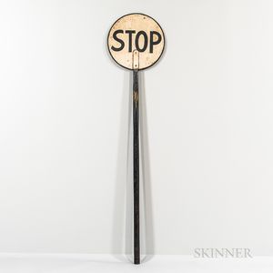 White- and Black-painted Stop Sign