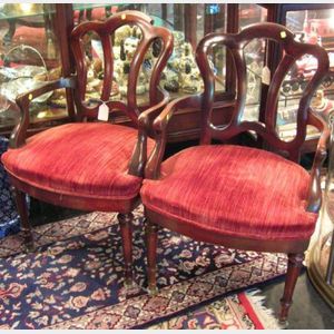 Pair of Late Victorian Rococo-style Walnut Open Armchairs