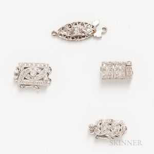 Four 18kt White Gold and Diamond Clasps