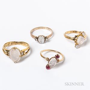 Four 14kt Gold and Carved Moonstone Rings