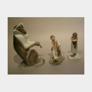 KPM Porcelain Monkey and Two Royal Copenhagen Porcelain Pan Figures.