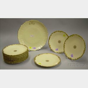Set of Ten Limoges Gilt Porcelain Dessert Plates and a Round Porcelain Platter.