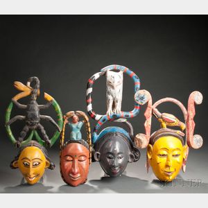 Four Ibibio Polychrome Carved Wood Face Masks