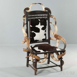 Cowhide-upholstered Carved Walnut and Horn Chair